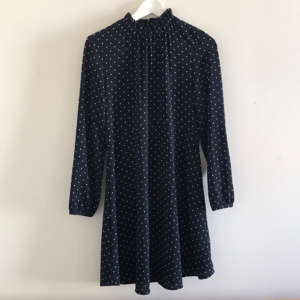High collared navy polka dot dress